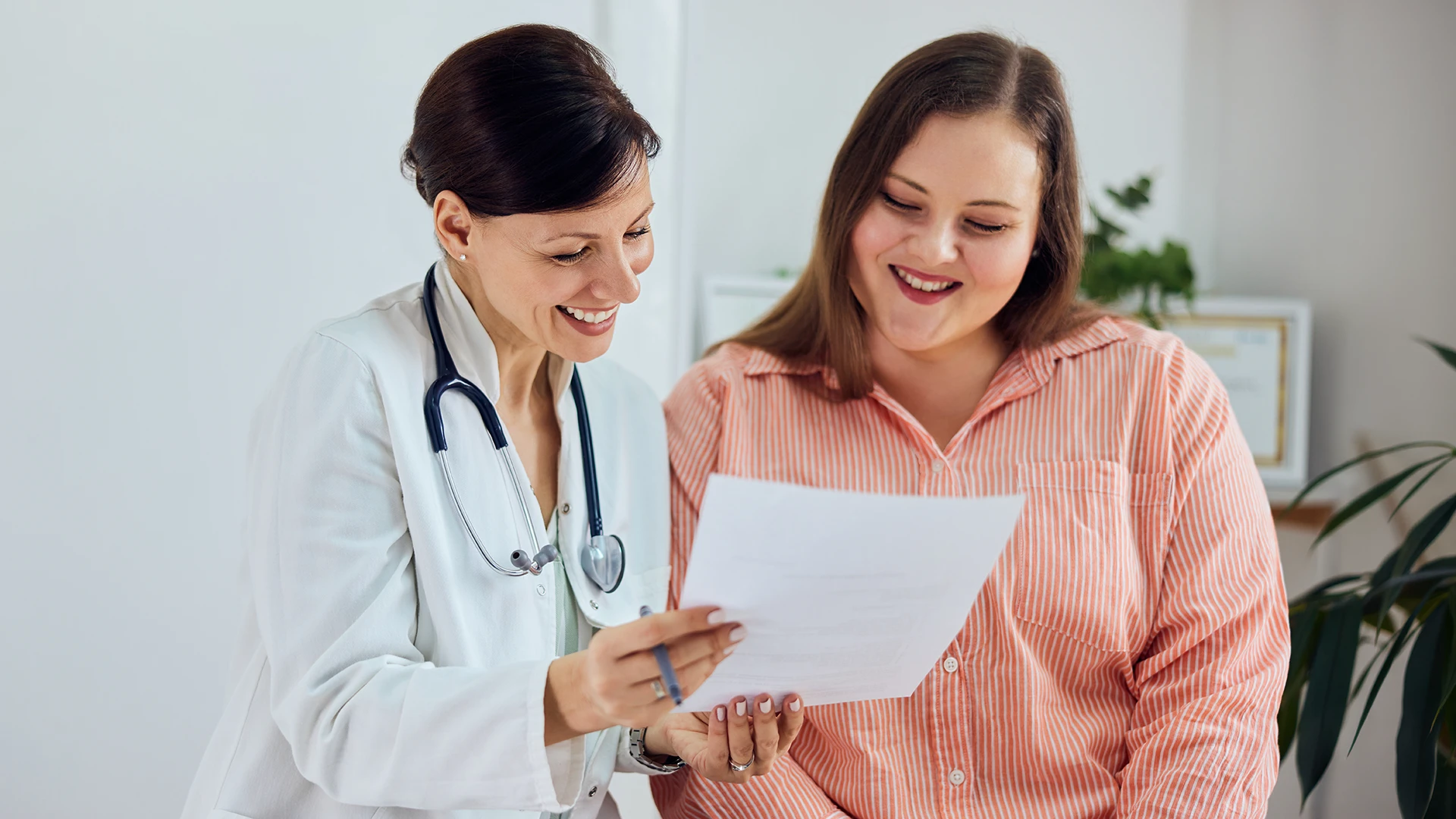 Patient reviewing GLP-1 semaglutide weight loss treatment options with a medical provider